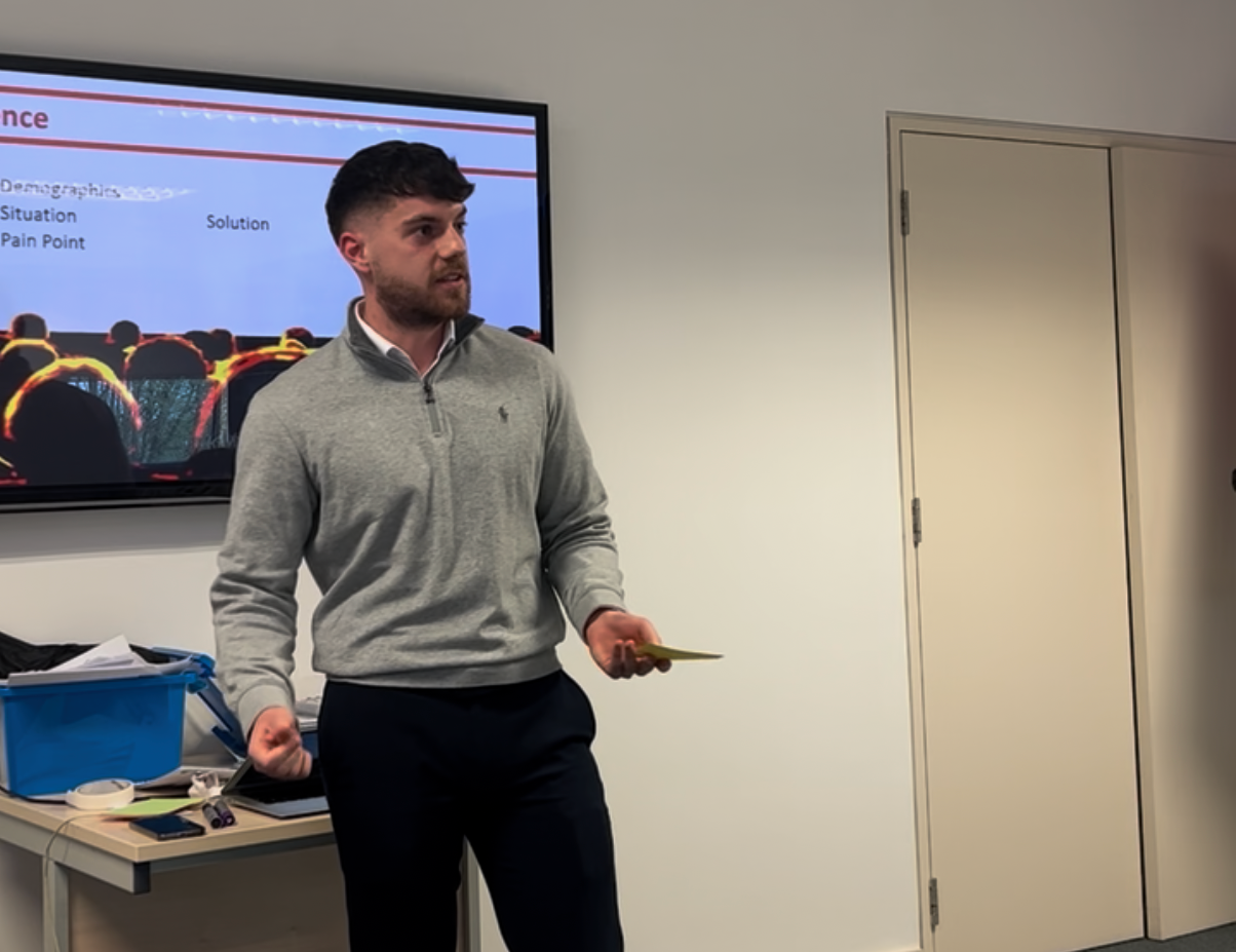 Tom Maguire working full time in a professional career